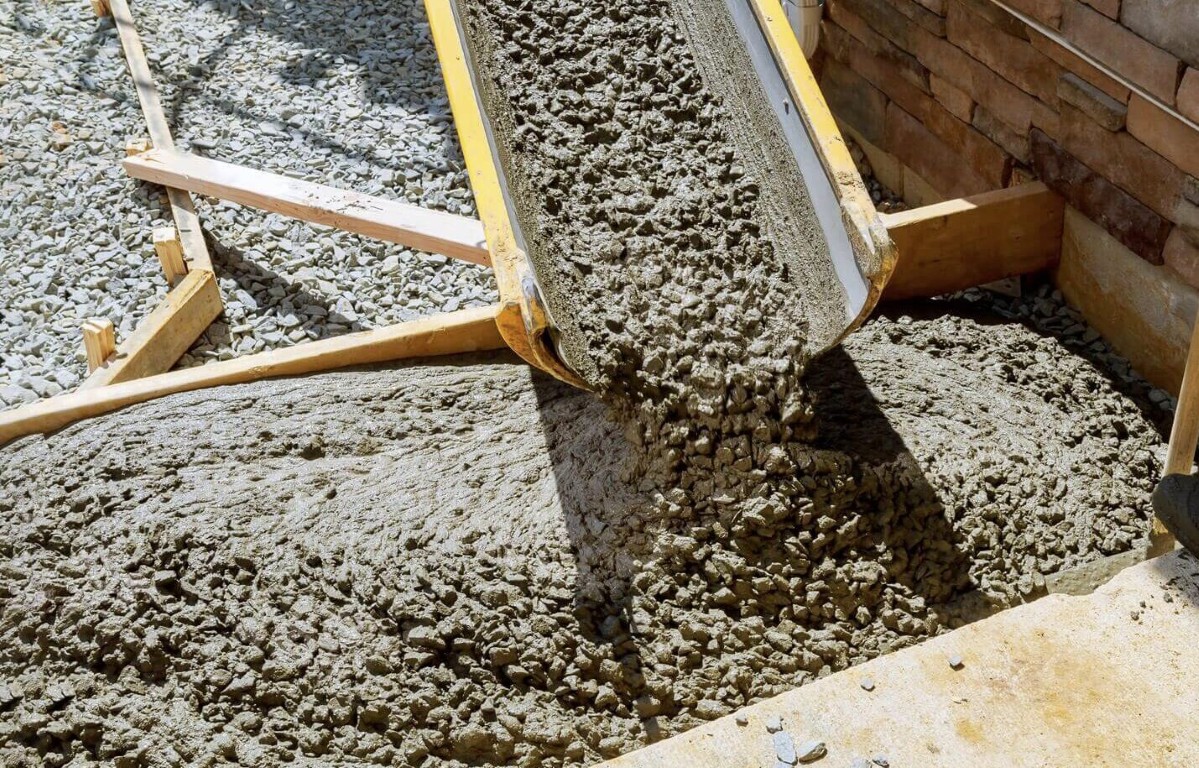 Professional concrete contractor pouring fresh concrete in Buckeye, AZ